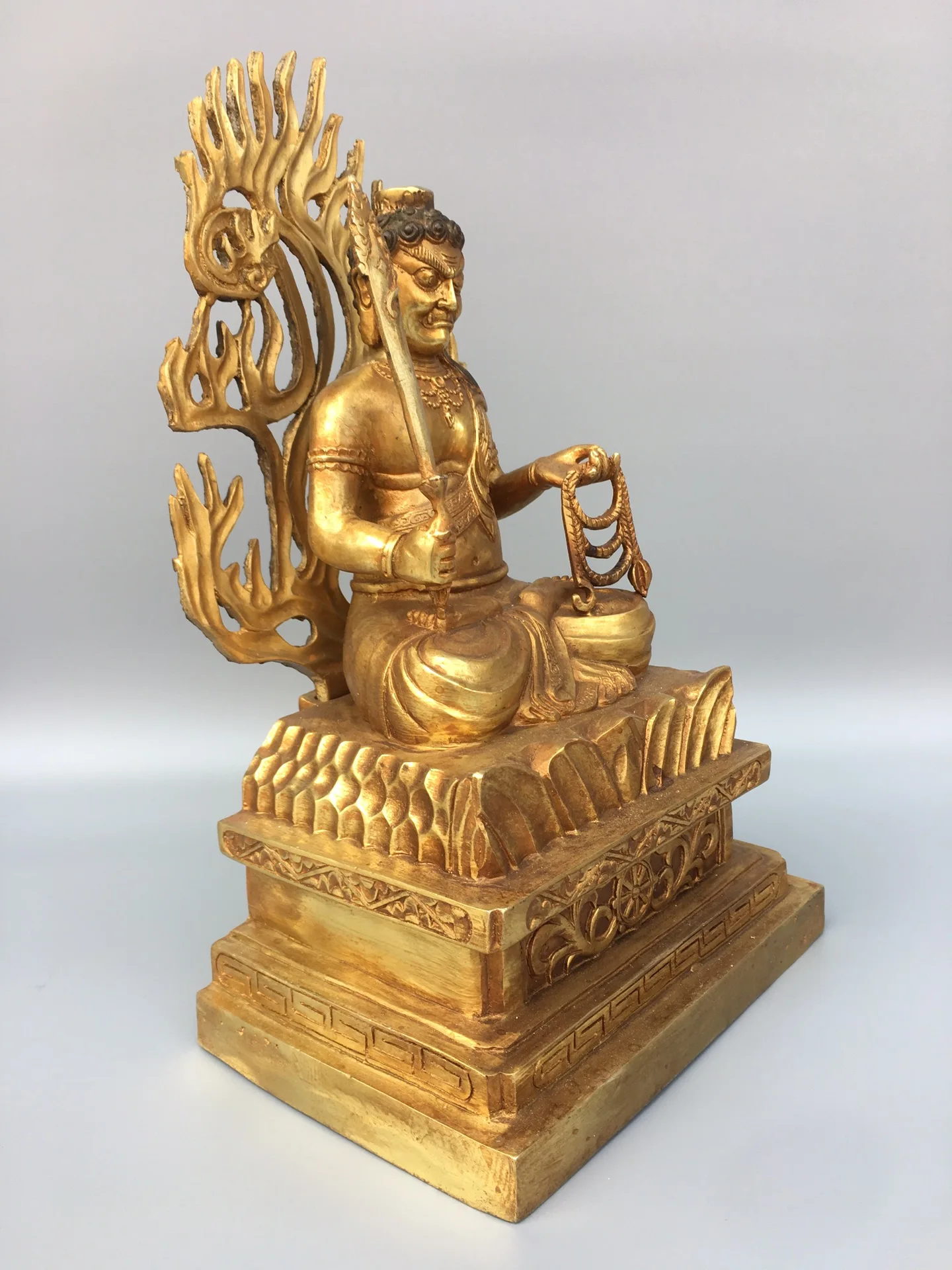 Fierce Acala Buddha Statue – Handcrafted Zen Protector Sculpture_three quarter left Fierce Acala Buddha Statue, seen from the left